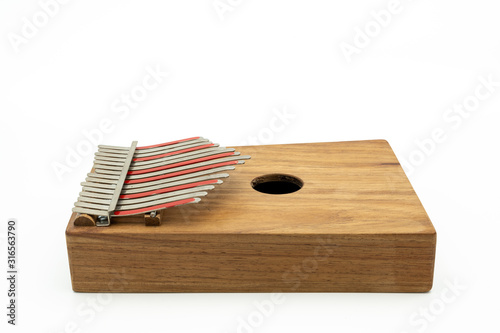 Thumb piano (Kalimba, Mbira) with silver and red tines