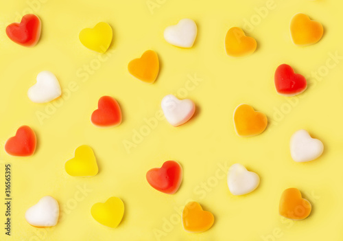 abstract background with hearts on yellow background