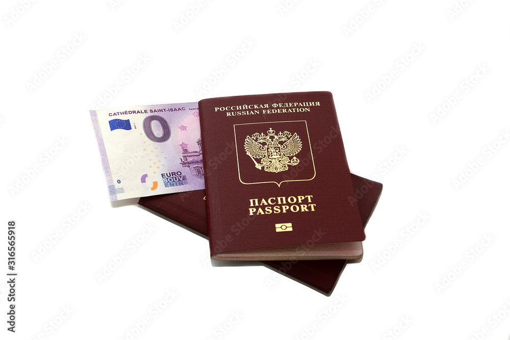 Two Russian foreign passports with a bundle of money. Immigration or tourism concept. Banknote zero euro 0 on a white isolated background. Traveling without money...