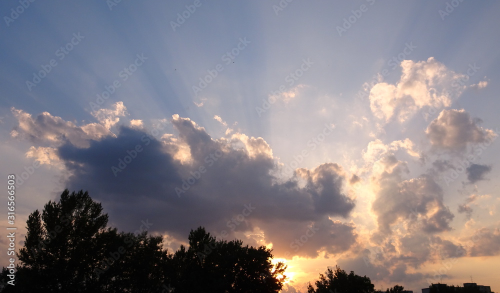 Fototapeta premium sunset betweenclouds