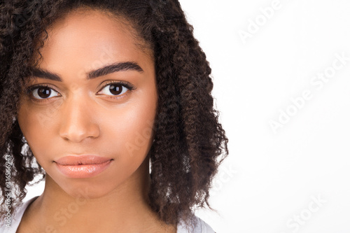 Close up portrait of serious beautiful afro woman