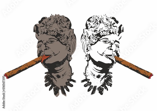 Old Cuban lady smoking a large cigar in La Havana in Cuba