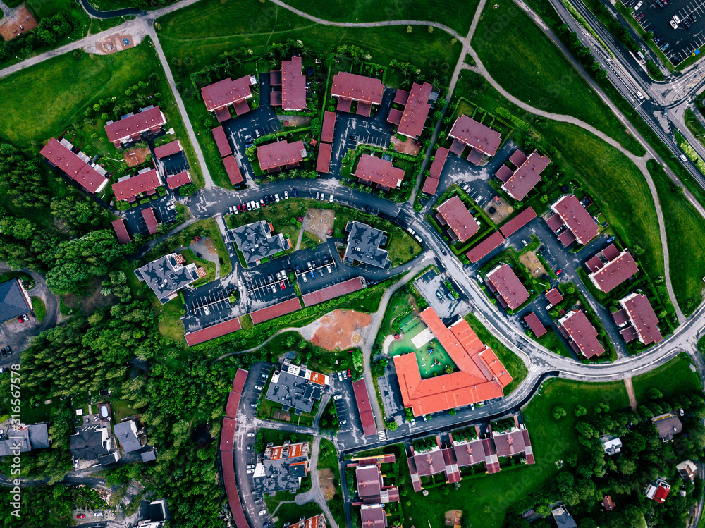 Obraz premium Aerial view of a small town or village in Europe. Finland countryside in summer.