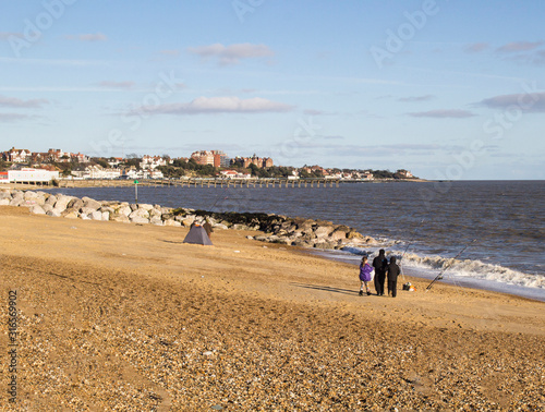 Sunny winter afternoon looking east across felixstowe beach. photo