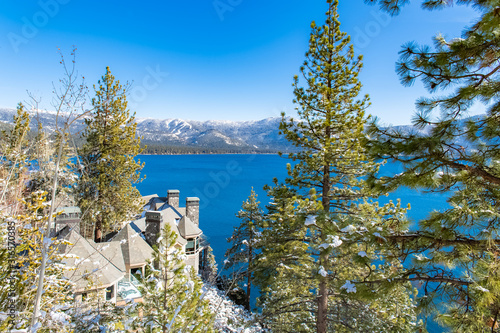 The Lake Tahoe in Nevada and California, panorama of the bay in winter, a house with a beautiful view