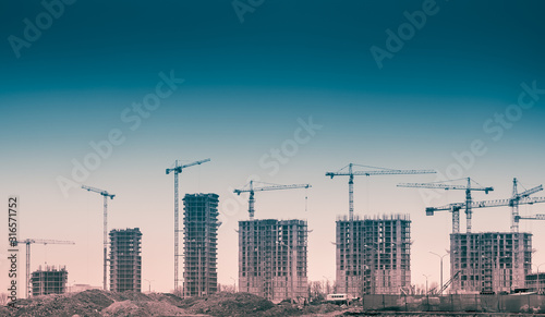 Picture of buildings under construction with construction crane