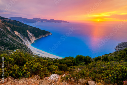 Εκτύπωση καμβά Beautiful summer sunset on Mirtos beach in Greece