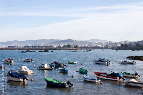Boats in O Cocho beach in Alcabre neighborhood in Vigo, Spain. photo