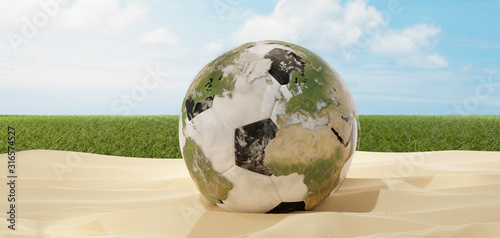 soccer ball in sand desert ...