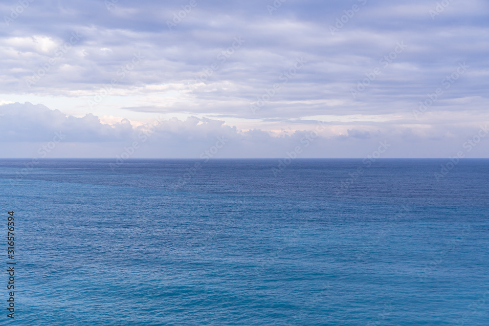 Seascape with sea horizon and almost clear deep blue sky, Background, copy space Seascape with sea horizon and almost clear deep blue sky, Background, copy space