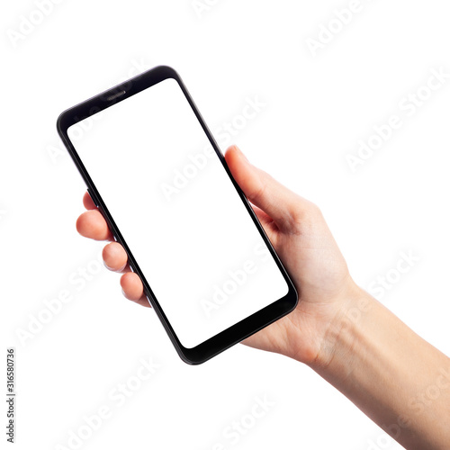 Woman holding smartphone with empty screen isolated on white background. Female hand with phone, space for text