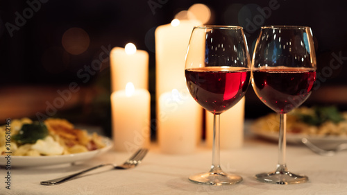 Two Glasses Of Red Wine On Served Restaurant Table Indoor