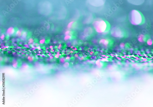 Gold (bronze) glitter shine dots confetti. Abstract light blink sparkle defocus backgound. © Liliia