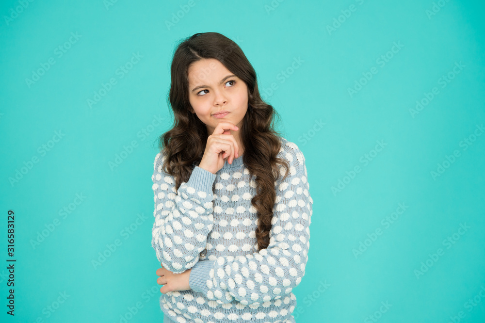 Why so serious. Little child with serious look. Serious girl blue background. Beauty and fashion. Serious but lovely Why so serious. Little child with serious look. Serious girl blue background. Beauty and fashion. Serious but lovely