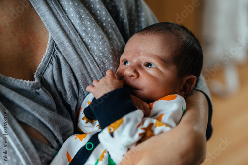 Authentic photography of a newborn with slightly lower birth weight.  photo