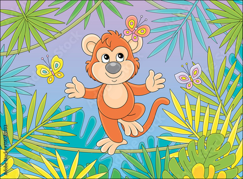 Funny cheerful monkey balan...