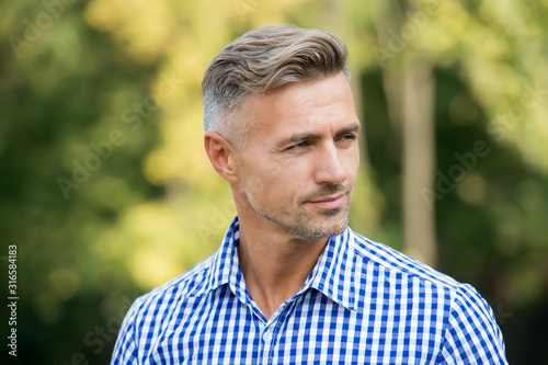 Handsome and confident. Handsome man on summer outdoor. Mature person with handsome face. Fashion and style. Grooming and style for older men. Handsome and well groomed