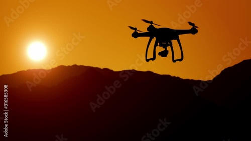 Aerial view of drone flying over mountains into the clouds during magical sunset.Super slow motion.
