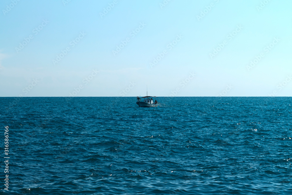 Sea, sky and boat