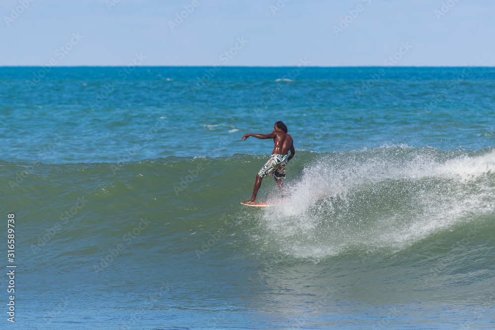Arugam Bay / Sri Lanka - April 25 2015 year: The surfing at Arugam Bay, Sri Lanka Island Arugam Bay / Sri Lanka - April 25 2015 year: The surfing at Arugam Bay, Sri Lanka Island