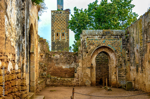 Ruins of the Roman city known as Sala Colonia and the Islamic complex of Chellah, mosque and minaret ruined. photo