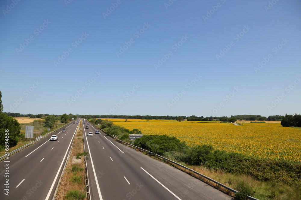 Sunfower Field and highway at Provence France Sunfower Field and highway at Provence France