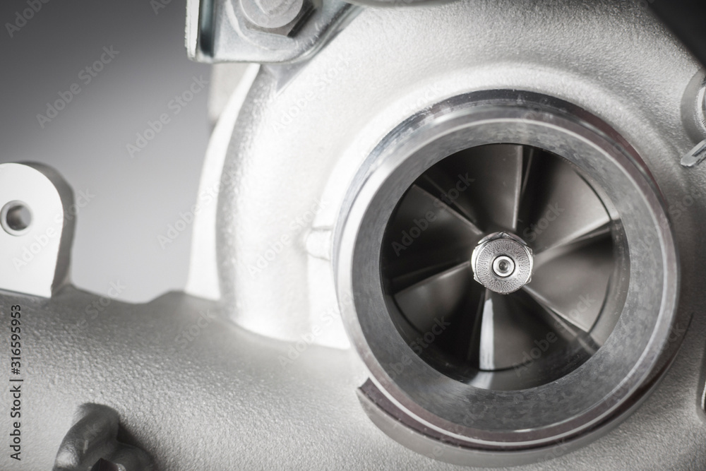 new turbine of car on white background. close up new turbine of car on white background. close up
