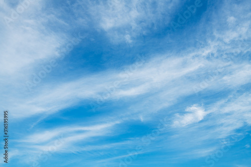 White clouds in blue sky. © nata777_7