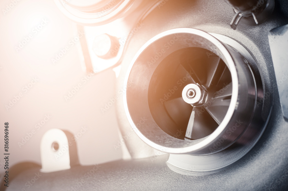 new turbine of car on white background. close up new turbine of car on white background. close up