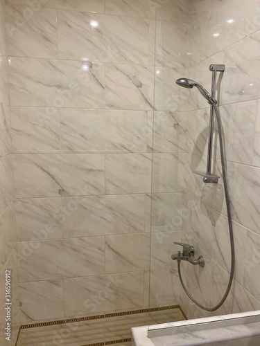 shower room with white tiles © Igor