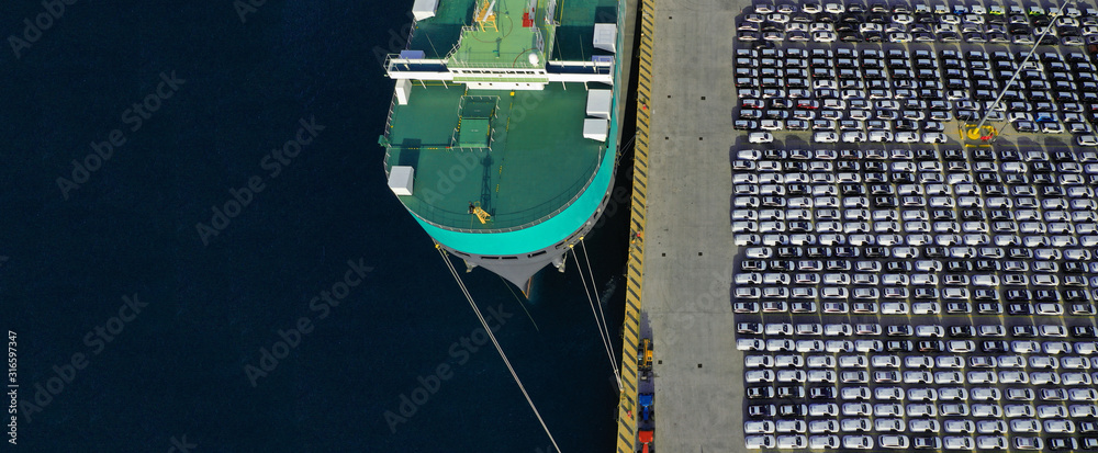 Aerial drone ultra wide photo of car logistics terminal in Mediterranean port