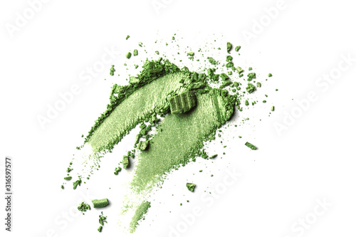 Green Eye shadow stroke isolated on white background. Top view, flat lay.