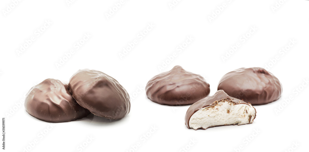 chocolate covered marshmallows on white background chocolate covered marshmallows on white background