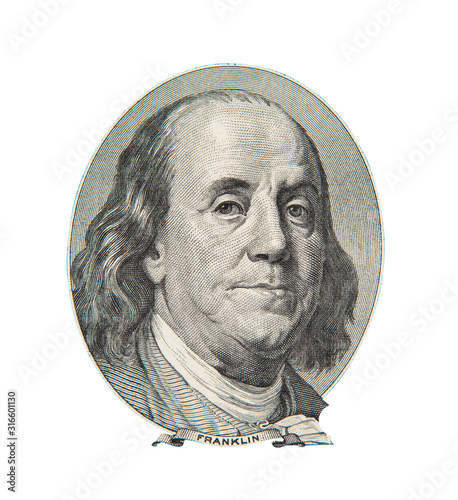 Benjamin Franklin portrait on one hundred US dollars banknote. Isolated on white. photo