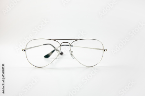 Transparent glasses on a white background