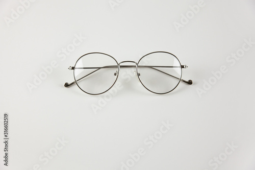 Transparent glasses on a white background