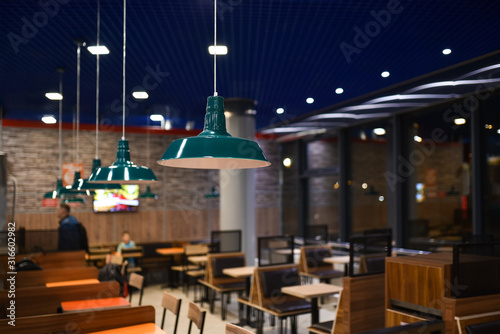 Evening interior of fast food cafe