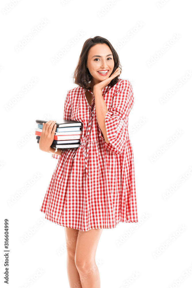 Beautiful young woman with books on white background Beautiful young woman with books on white background