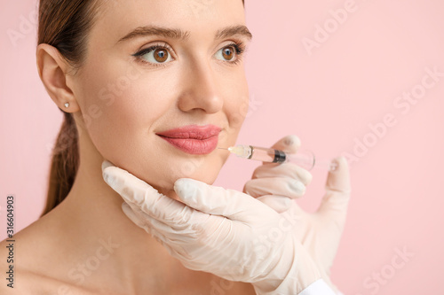 Young woman receiving fille...