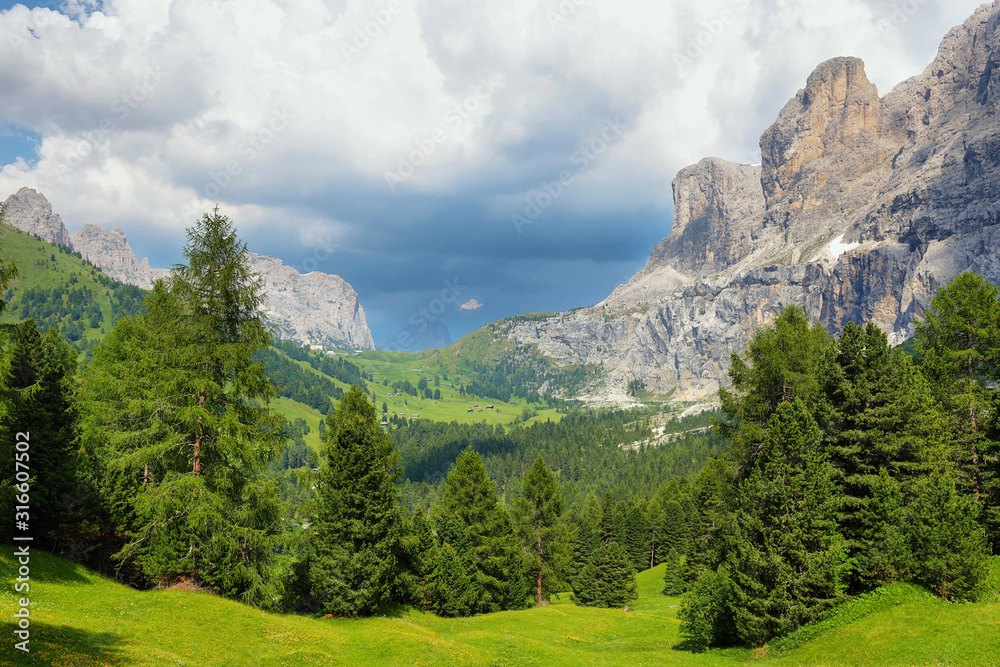 View of mountains and valley from Gardena pass, Dolomites Alps , Italy, Europe