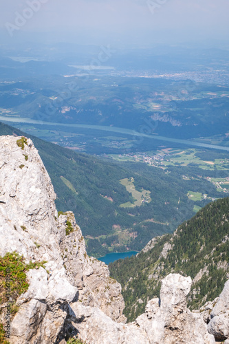 View from mountain Hochobir to valley Rosental, lake Freibach Stausee