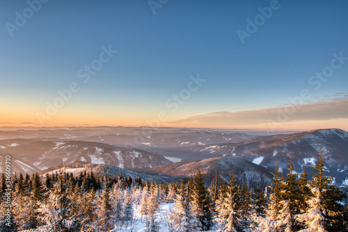 Colorful winter sunrise in mountains. beskydy czech