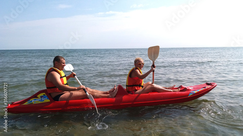 People ride a boat, on canoe, Kayaking © Taras