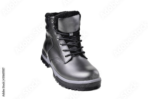 Winter male black leather boot on a white background, hiking shoes, practical off-road shoes, close-up