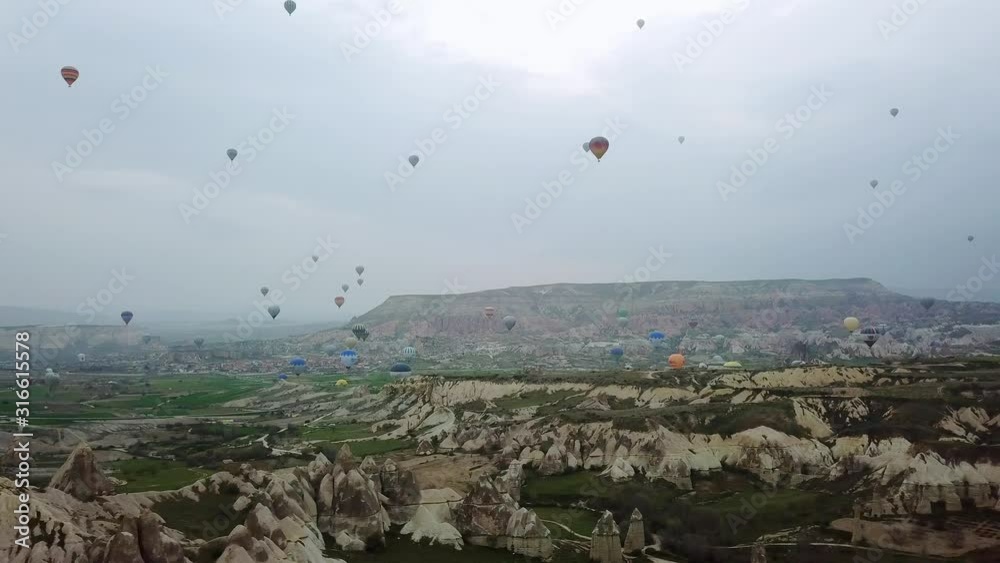 Air Balloon in the sky, Air Balloon in flight in the blue sky, Aerial view of Balloon at sunrise in Cappadocia Air Balloon in the sky, Air Balloon in flight in the blue sky, Aerial view of Balloon at sunrise in Cappadocia