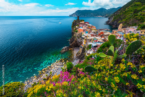 Picturesque Vernazza village and colorful mediterranean flowers  Cinque Terre  Italy