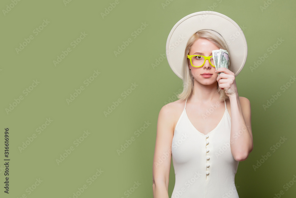 Beautiful blonde girl in glasses with money Beautiful blonde girl in glasses with money