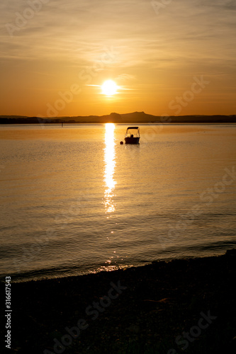 Sunset on the lake  boat