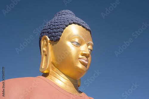 golden buddha statue in ladakh monastery 