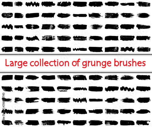 Large collection of grunge brushes. Abstract lines with a dry brush. Smears of black paint. Ink spots on a white background